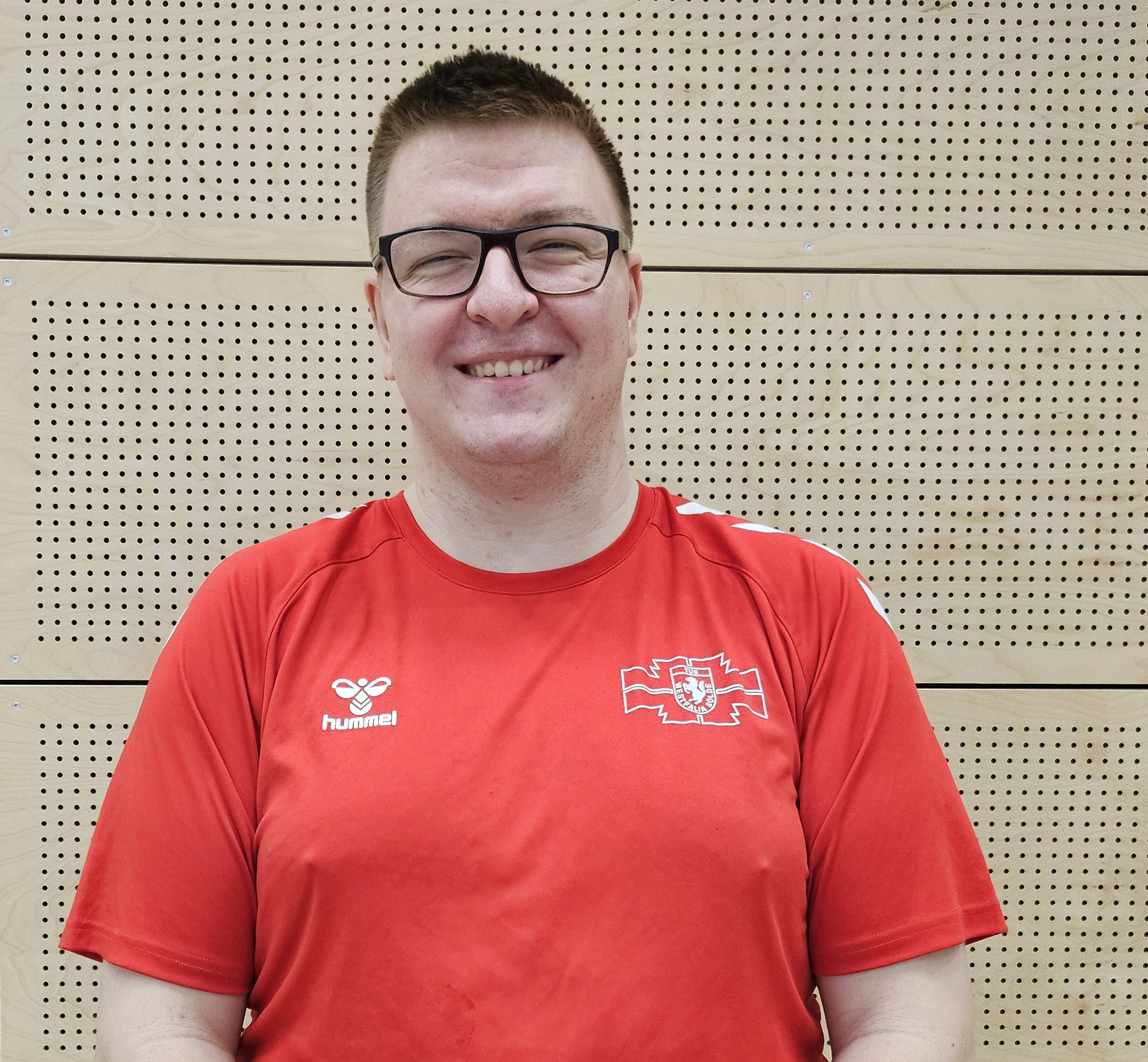 Default placeholder fitness trainer in a T-shirt.